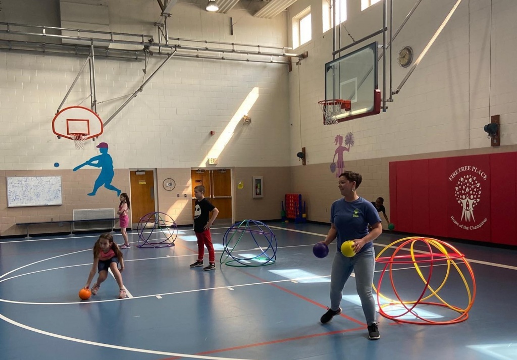 firetree place kids playing ball in the gym